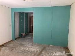 ترميم دهانات جدران بمكة